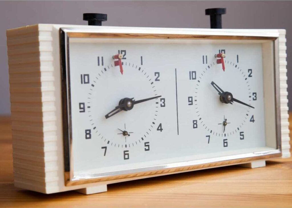 old white manual chess clock