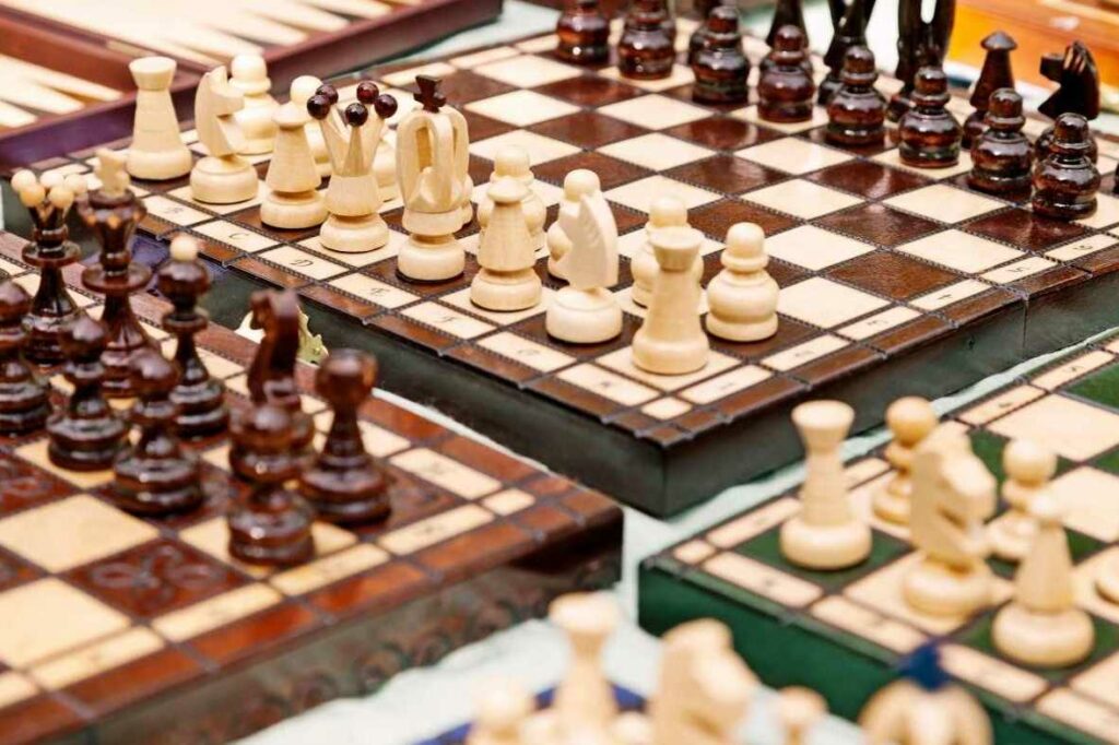An assortment of chess boards and pieces