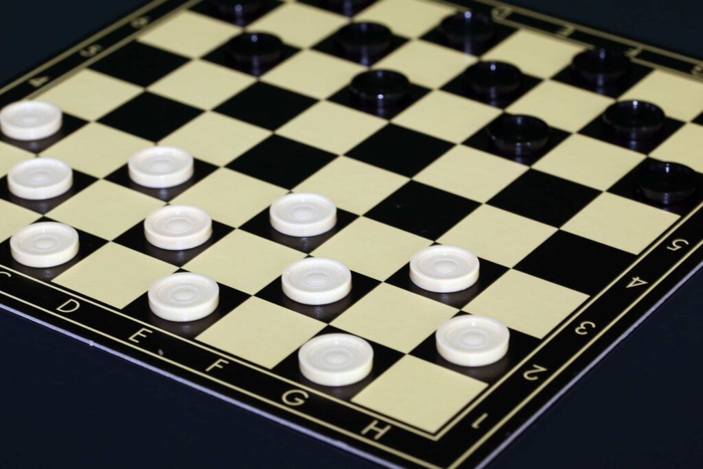 checkers draughts board and pieces