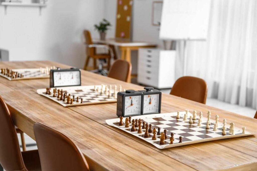 Boards set up for a chess club or chess competition